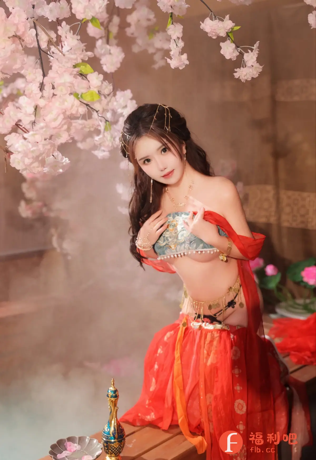 描述:画面中是一位妩媚动人的亚洲女性,她身着精致的古风服饰,妆容典雅,乌黑的长发挽起,点缀着华丽的发饰。她佩戴着璀璨的珠宝首饰,包括项链、耳环和手链,更显尊贵。服饰的色彩鲜艳,红色和金色交织,彰显了热情和富贵。她的身材曼妙,肌肤白皙,充满诱惑力。背景是精心布置的场景,有盛开的樱花,朦胧的雾气,以及精致的摆件,营造出一种梦幻般的氛围。整体画面充满东方韵味,令人赏心悦目。
